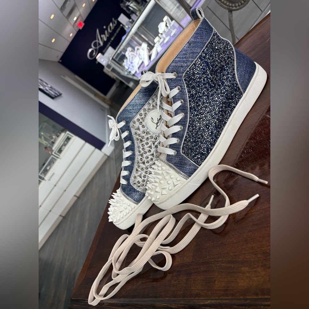 CHRISTIAN LOUBOUTIN “Lou Degra Spikes” high top sneakers